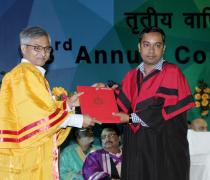 Director Presenting the Degree