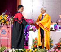 Director Presenting the Degree