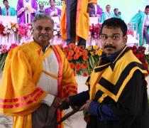 Director Presenting the Degree