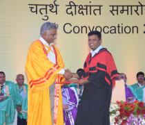 Director Presenting the Degree