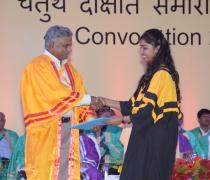 Director Presenting the Degree