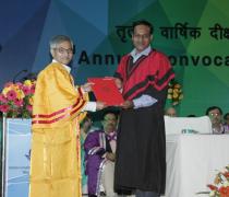 Director Presenting the Degree